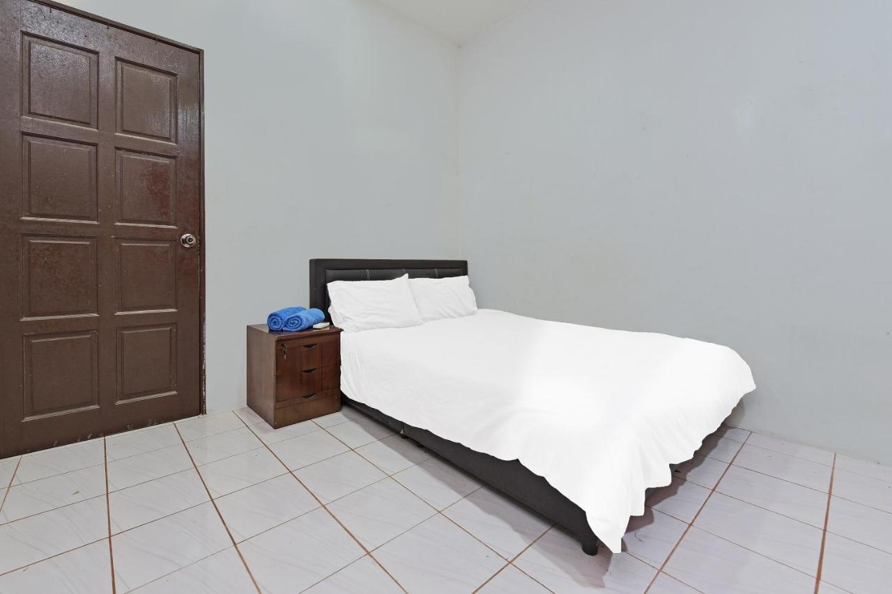 Oyo 90596 Casaria Inn Paka ภายนอก รูปภาพ